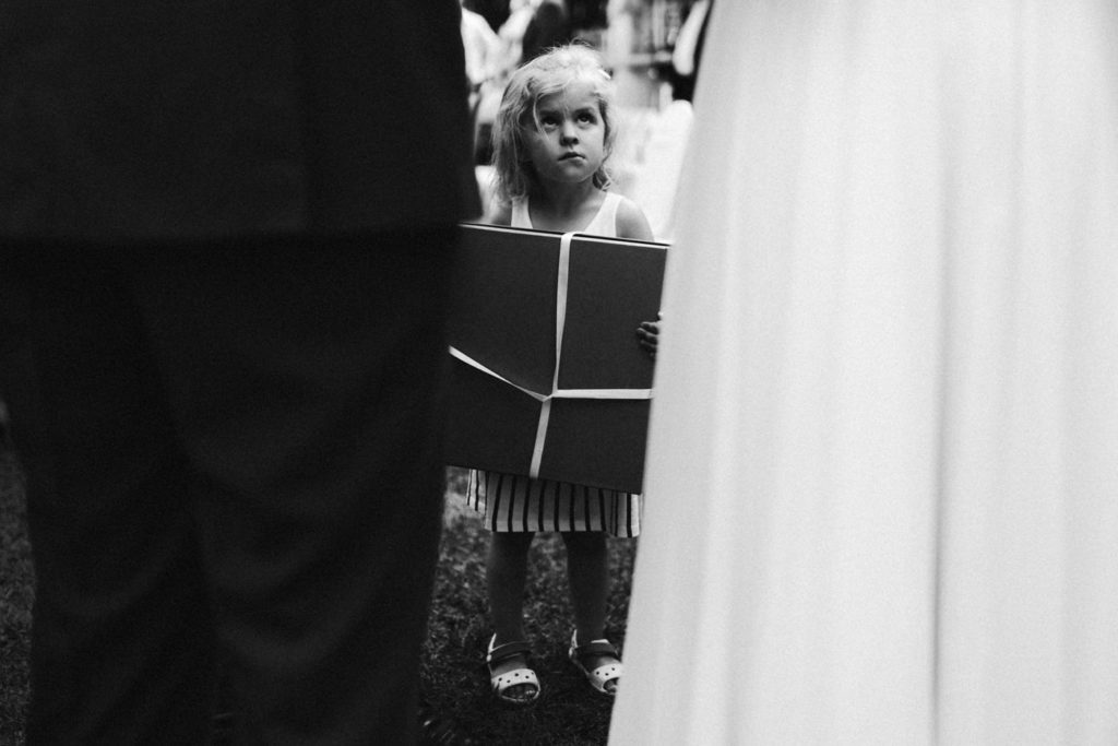 Photojournalistic wedding pictures London, England. Candid emotions, natural and free. Cute kids at the wedding. Gifts for the bride and groom.